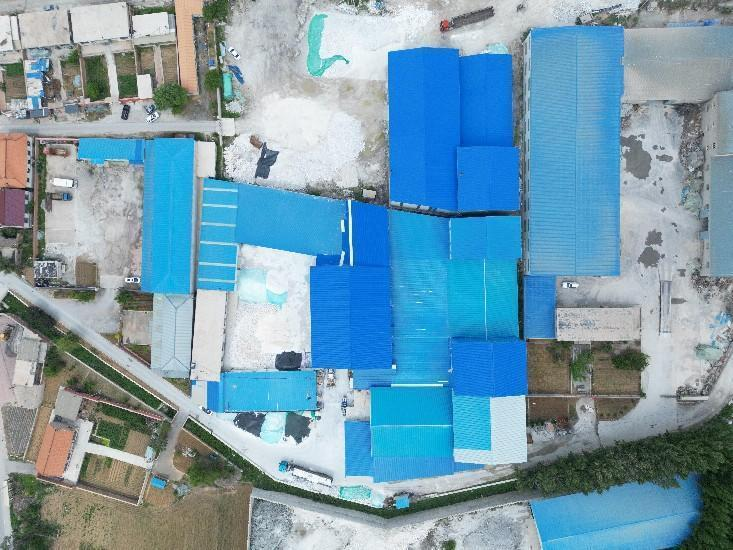 TDHX factory aerial photograph from the company brochure